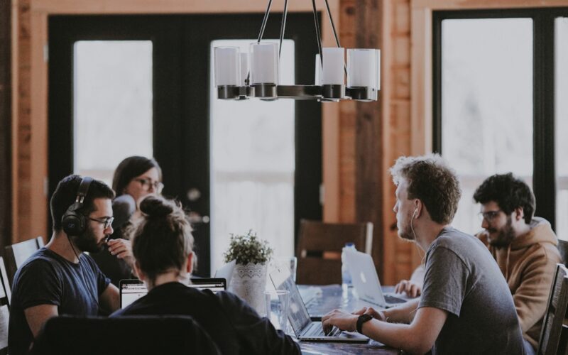Tech professionals in collaborative workspace representing AI talent