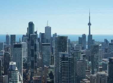 Toronto financial district skyline with the CN Tower and Lake Ontario behind it