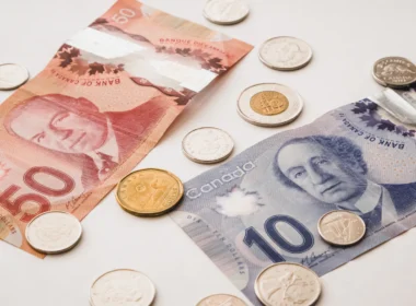 A bunch of money sitting on top of a table
