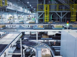 A factory filled with lots of machines and boxes