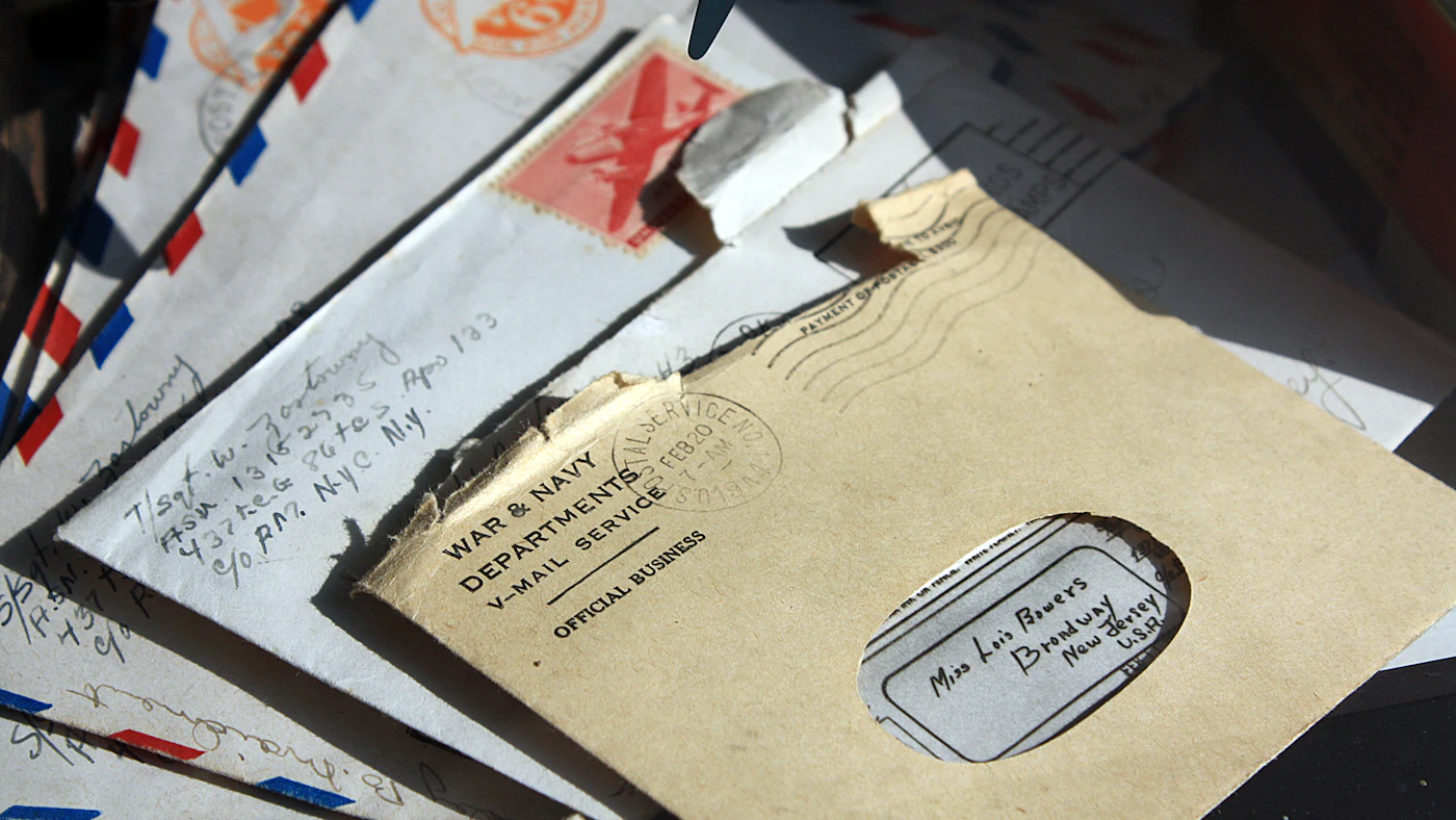 A pile of opened envelopes