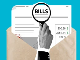 Paper cutout of a hand holding a magnifying glass over bills in an envelope.