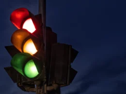 Black traffic light turned on during night time