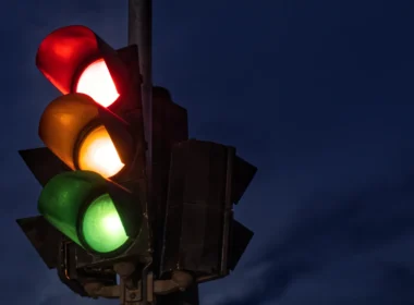 Black traffic light turned on during night time