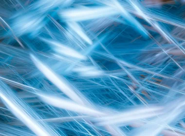 Pale blue light streaks crossing a dark blue background, an abstract image of compute time on a Canada EuroHPC link