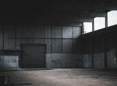 Empty building with a closed roller shutter