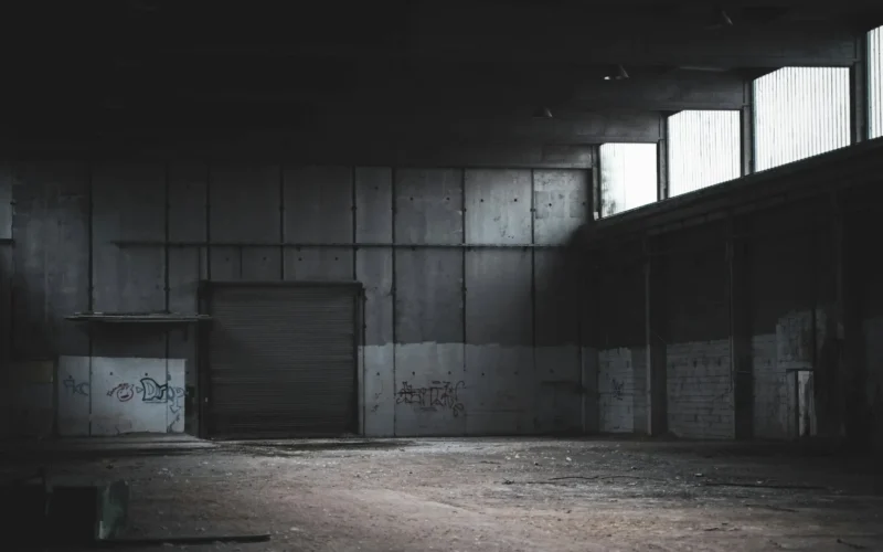 Empty building with a closed roller shutter