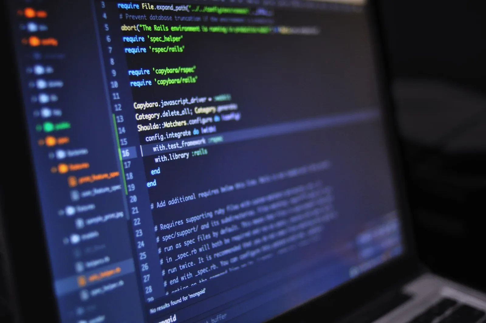 Image upload security: close-up of programming code on a dark screen.