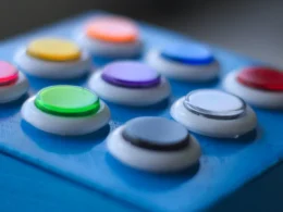 Blue, white, green, yellow and red buttons