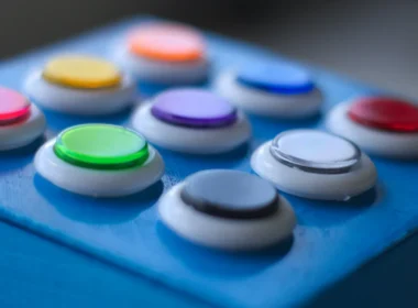 Blue, white, green, yellow and red buttons