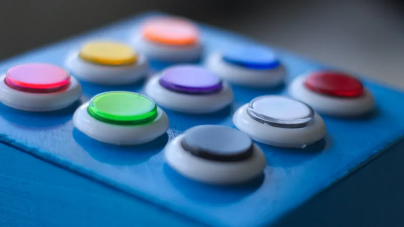 Blue, white, green, yellow and red buttons