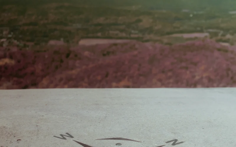 Compass rose on a stone surface