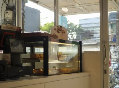 Counter with display case and 'order' sign