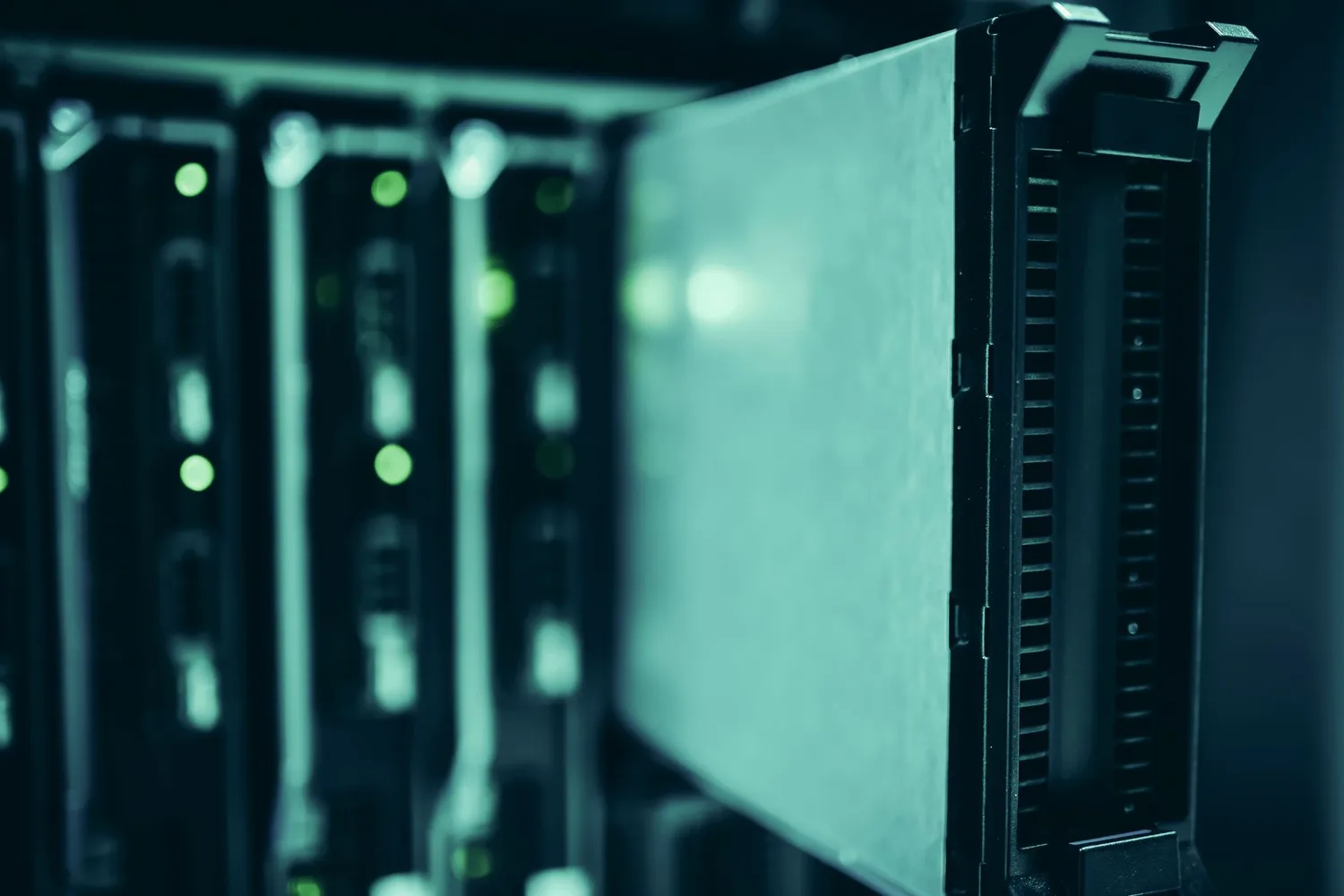 Server racks in a data centre, the compute cost named in the Anthropic S-1 risk factors