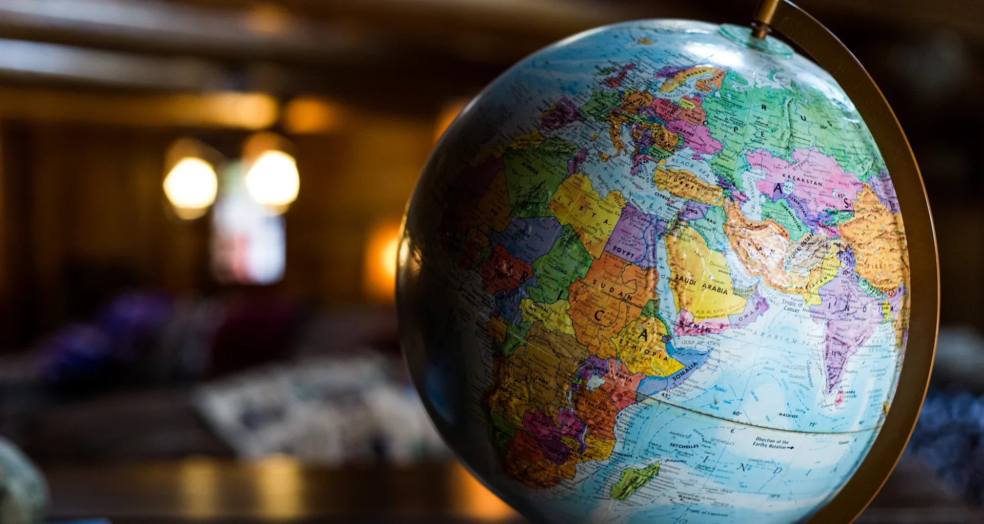 Desk globe on table.