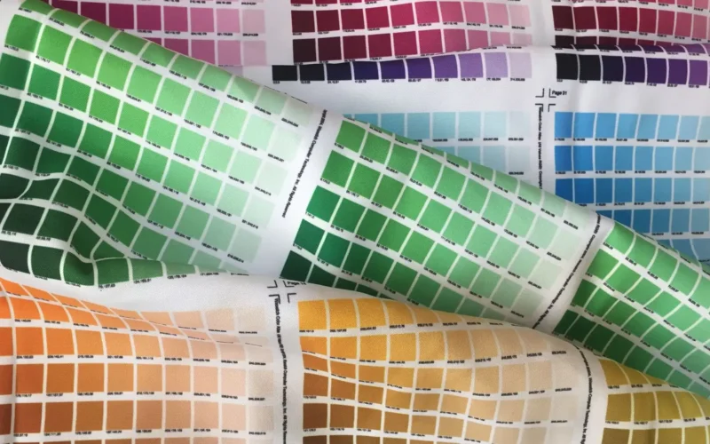 Rows of colour swatches printed on rippled fabric, a stand-in for the product data enrichment a catalogue needs