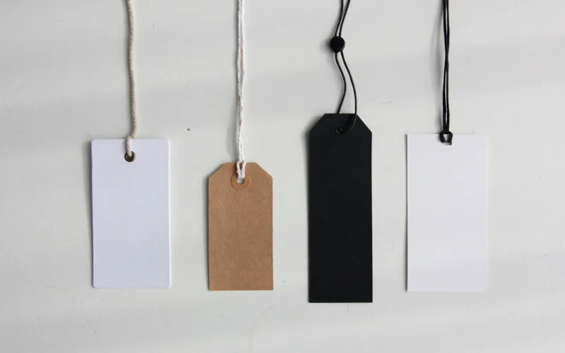 Four paper card tags