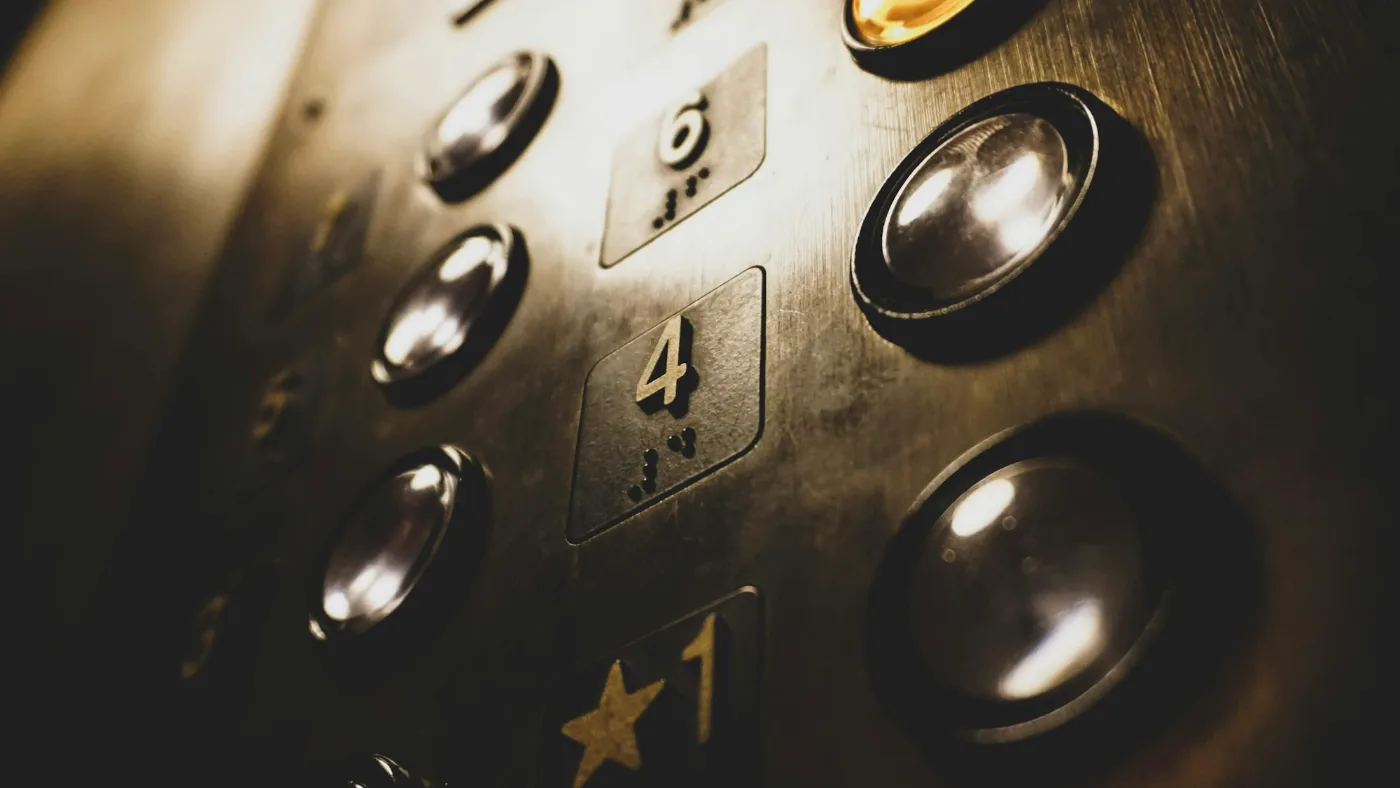 Close-up of elevator push buttons