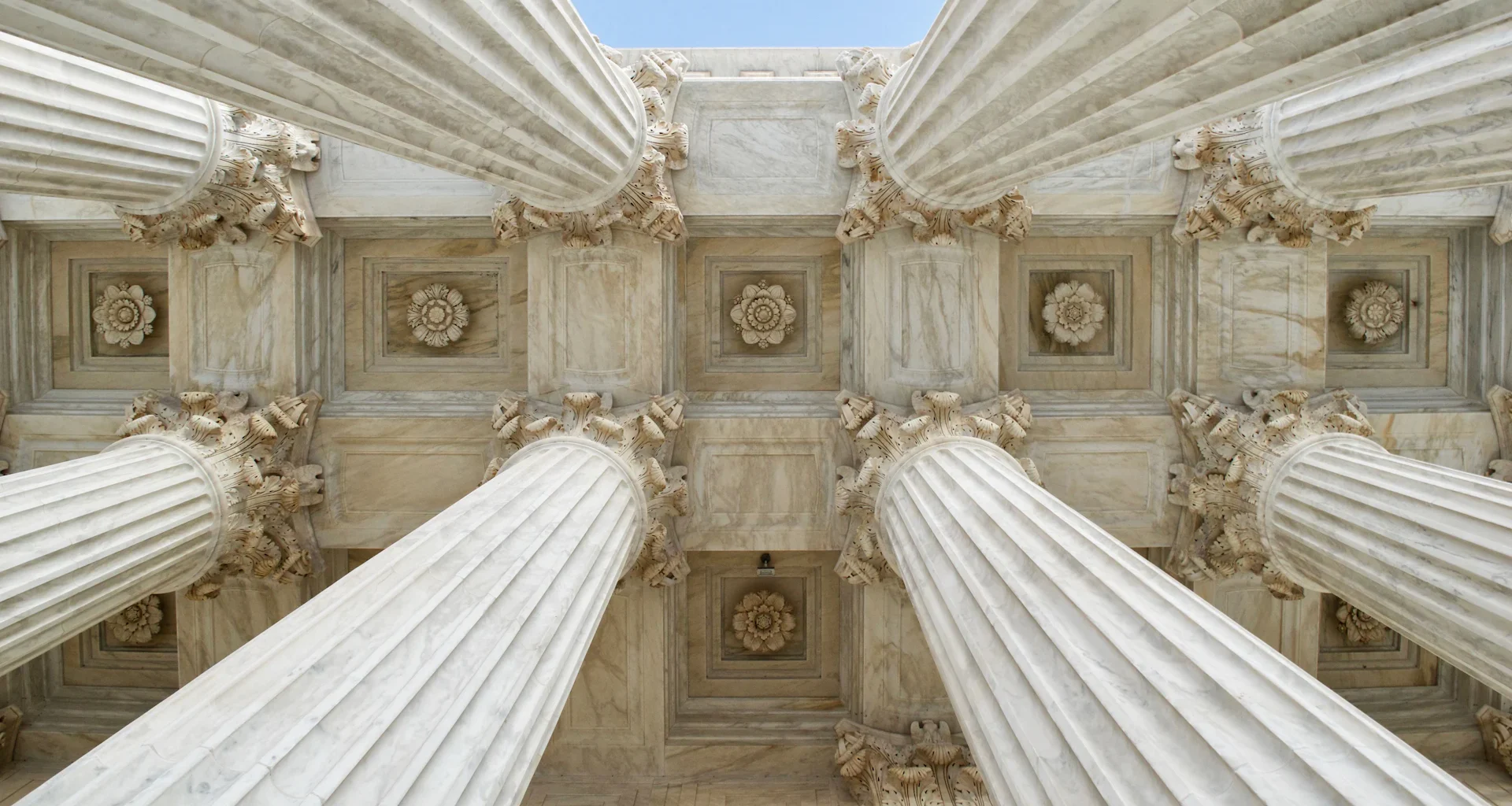 Gray stone columns worm's-eye view photo
