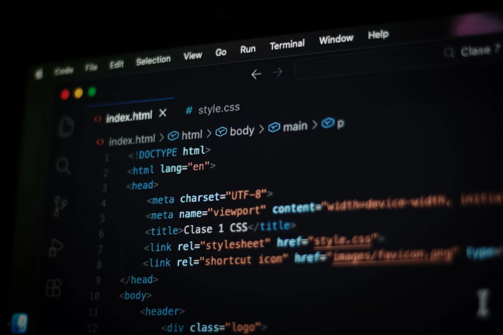Code editor in dark mode on a screen, the kind of file where an agent could hide a split token from secret scanning