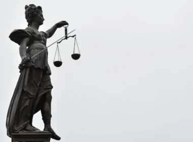 A statue of Lady Justice holding a set of scales