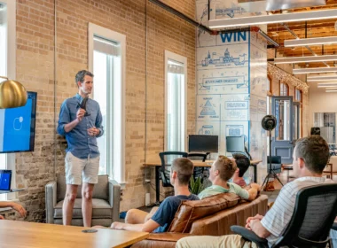 Man presenting to a group of colleagues