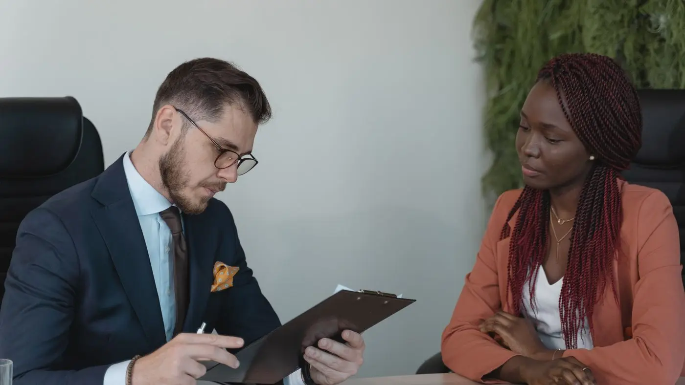 Hiring manager reviewing an entry-level resume, a snapshot of youth hiring in Canada