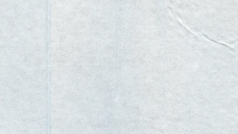 Light grey paper with a soft fold