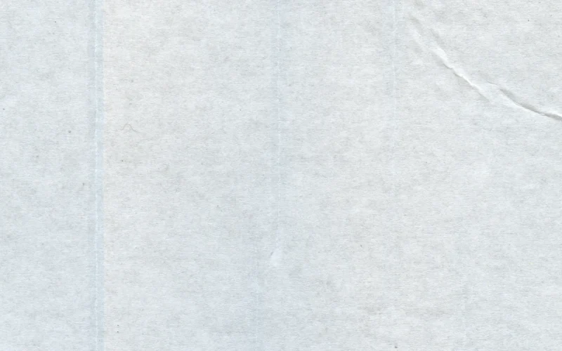 Light grey paper with a soft fold