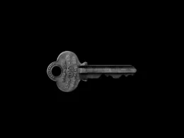 Photo of key against black background