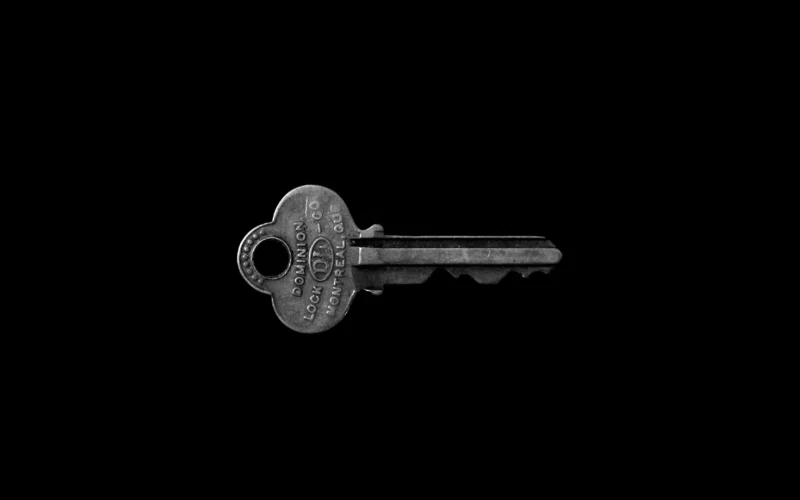 Photo of key against black background