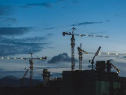 Several cranes above the buildings