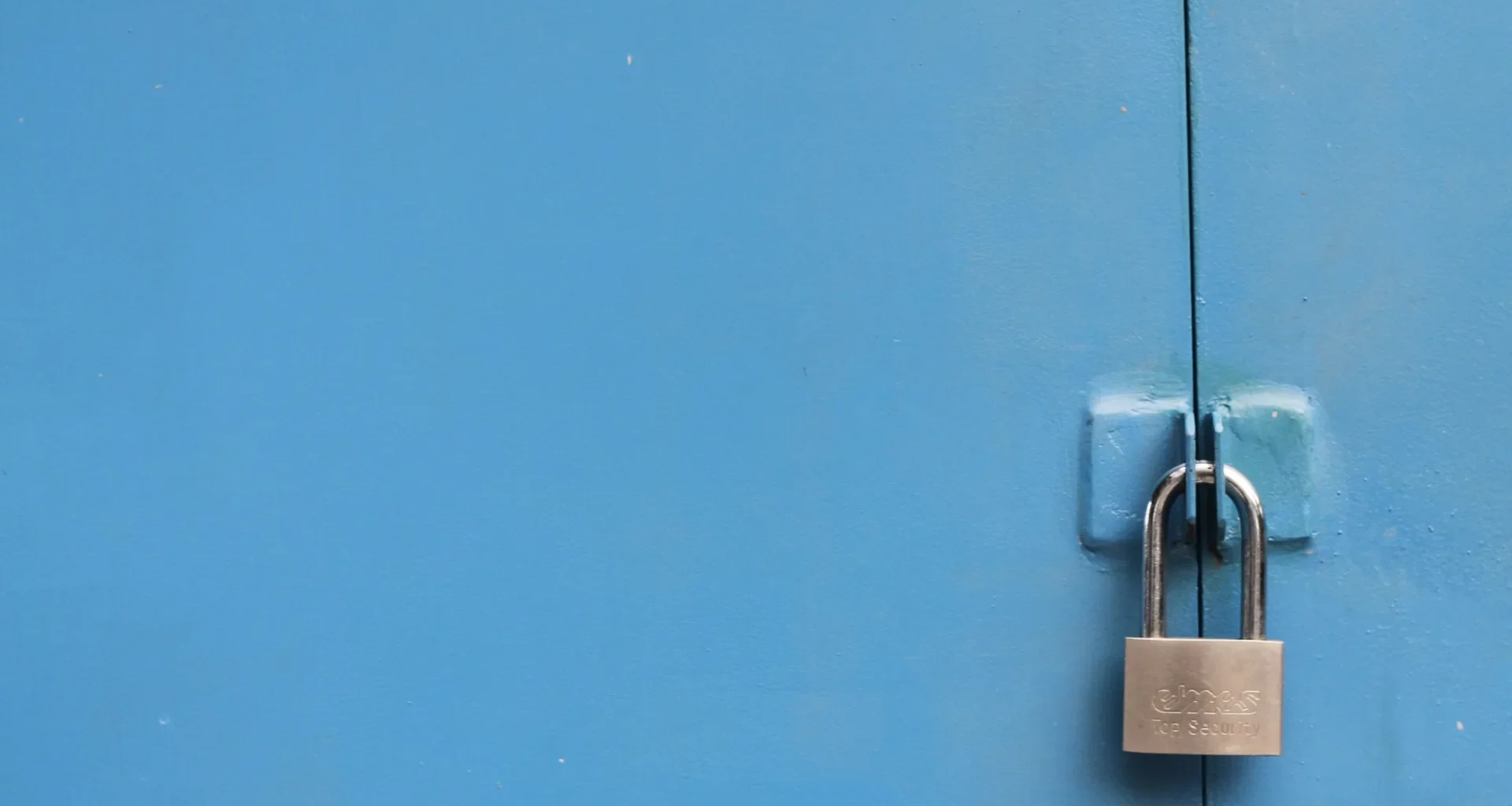 A silver padlock close up