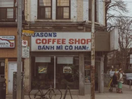 Building on a street corner with a parked bike