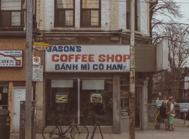 Building on a street corner with a parked bike