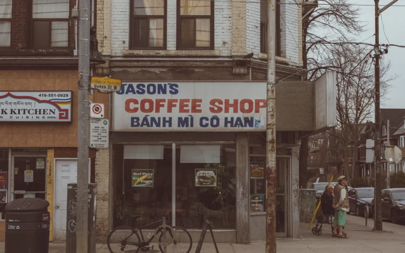 Building on a street corner with a parked bike