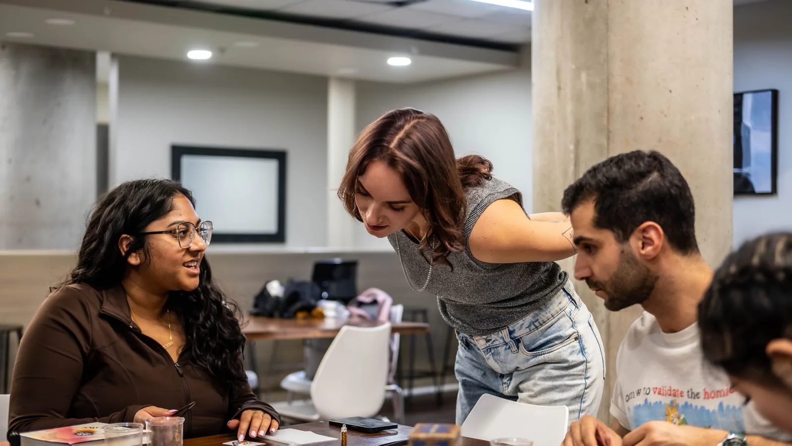 Hiring team in a Toronto office reviewing applications, the step Ontario AI job posting disclosure now covers