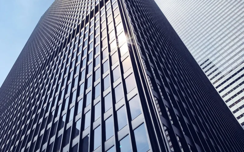 Low-angle view of a glass office tower in downtown Toronto, home to the banks that OSFI supervises