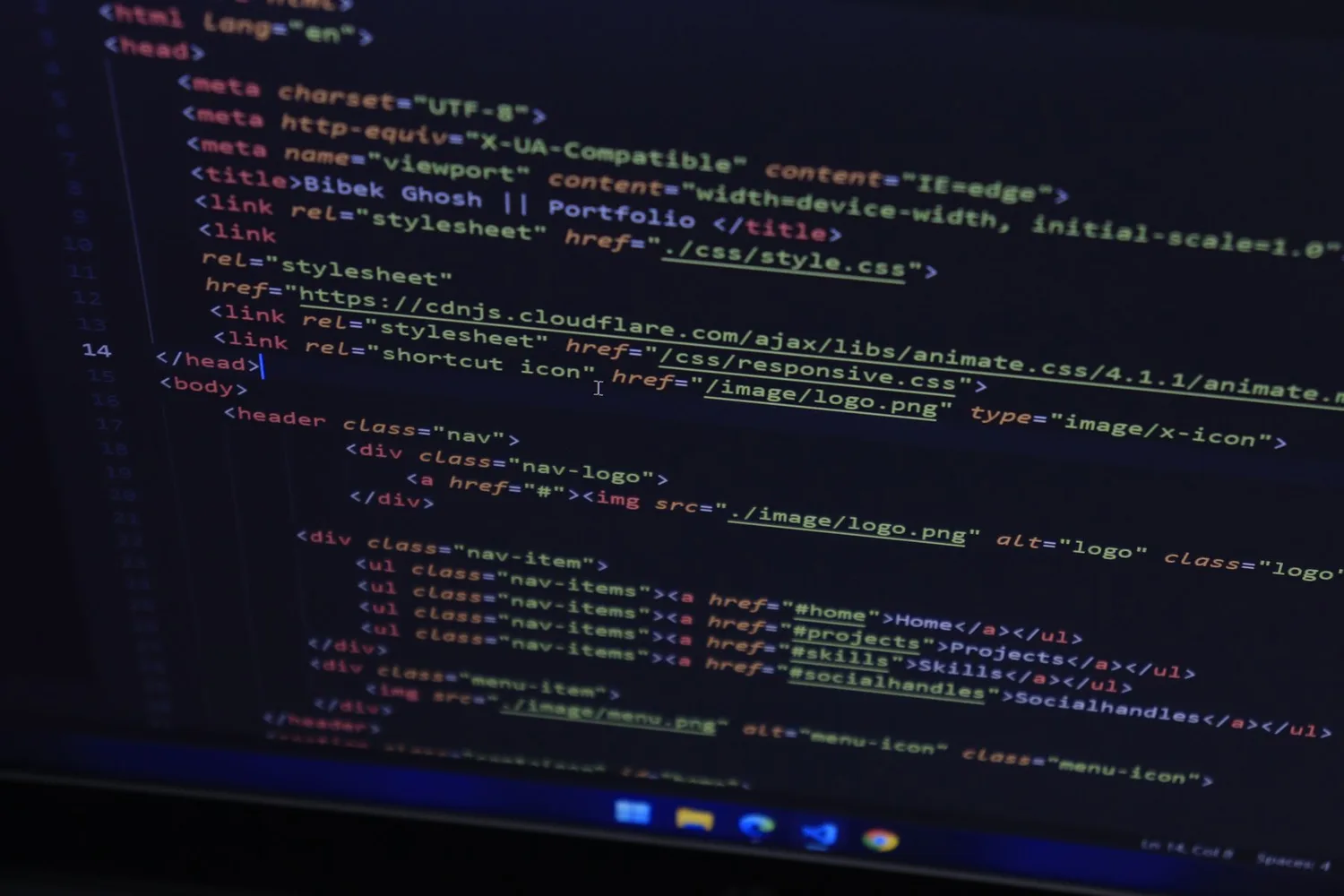 Website code on a monitor, where AI agent attacks on online stores look for upload and login flaws